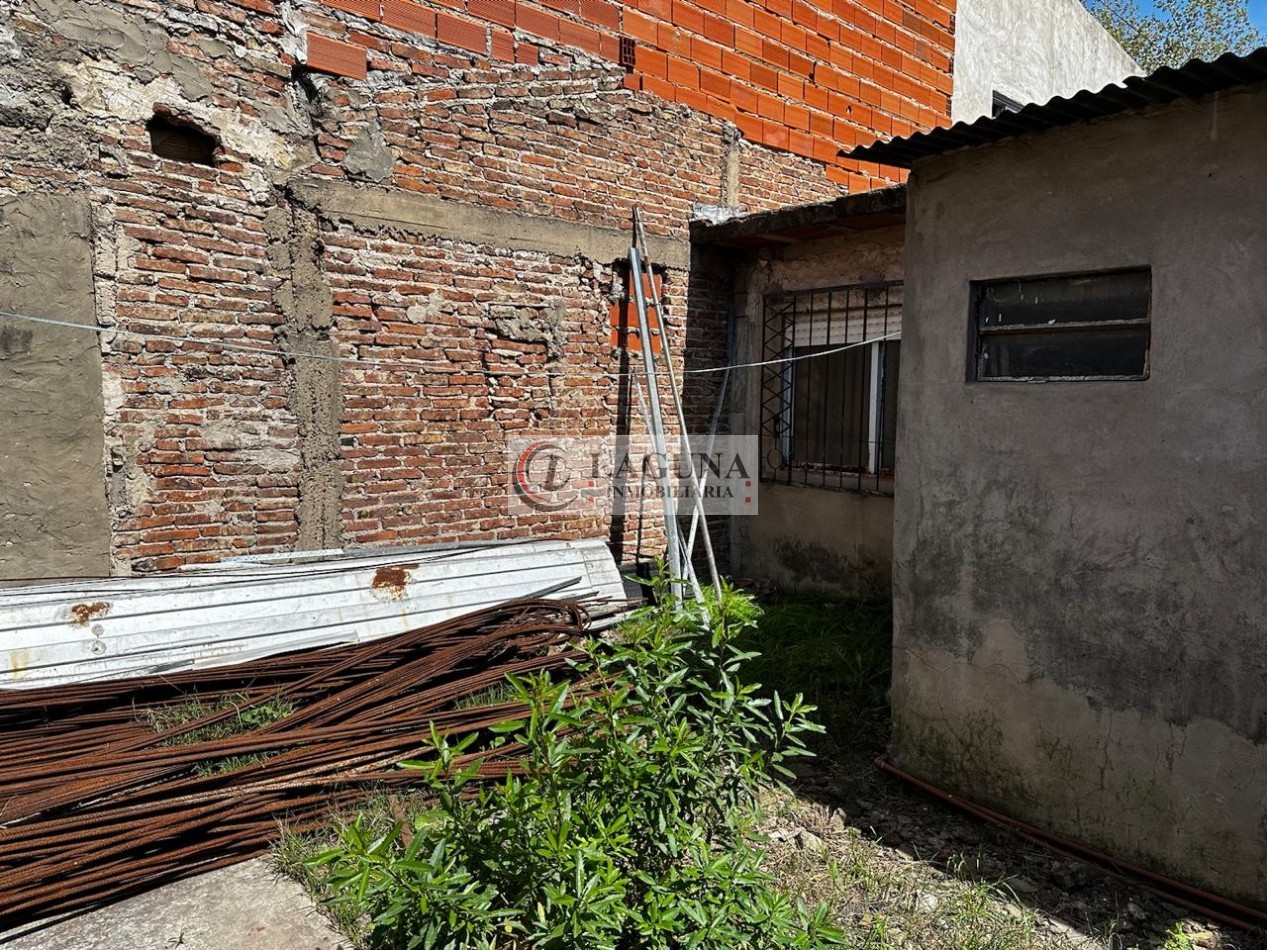 VENTA DE TERRENO CON CASA  A REMODELAR