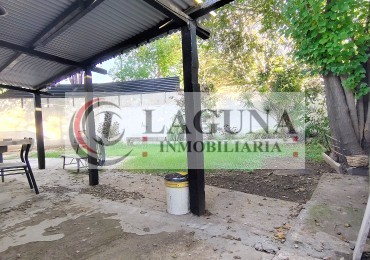 VENTA DE CASA MODERNIZADA CON GRAN LOTE, GARAGE Y GALPON
